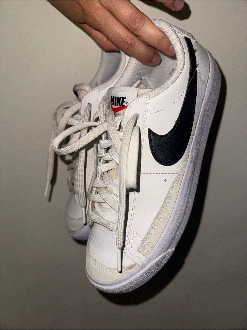 Nike White Leather Sneakers with Black Swoosh